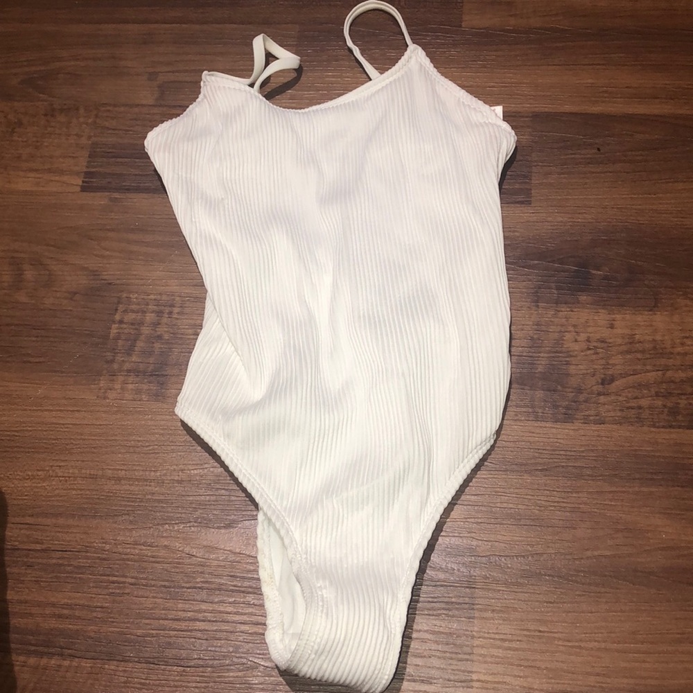 Never worn! Ribbed one piece